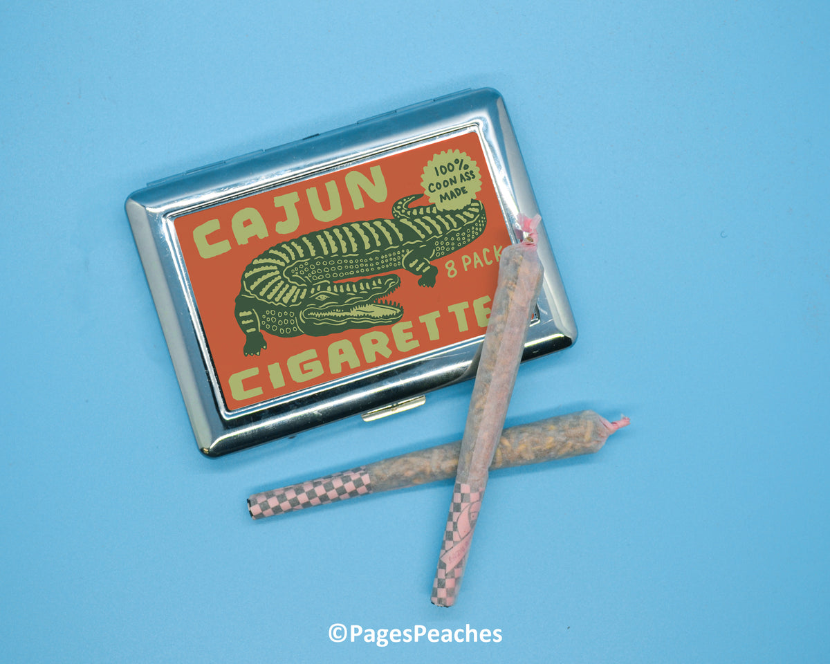 a cigarette case and two cigarettes on a blue background